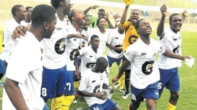 Hydel High players celebrate their extra time 2-1 win over Excelsior High in their Manning Cup semi-final match at the National Stadium yesterday. (Photo: Garfield Robinson)