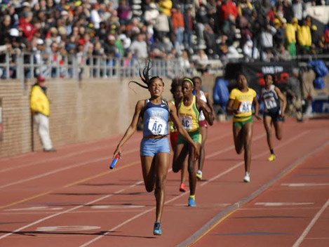 Ewdin Allen team corsses the Finish line in the 4x100 