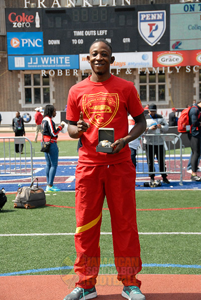 Odaine Lewis of Cornwall College - Triple Jump winner