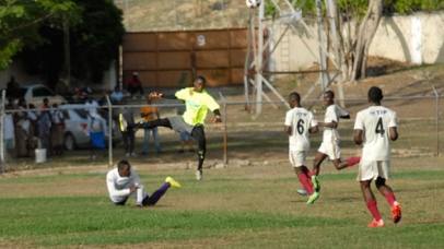 Game action between St. James and Irwin