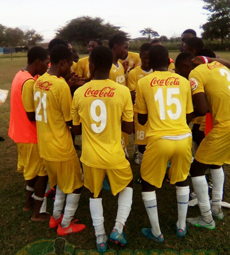 Garvey Maceo High in the huddle