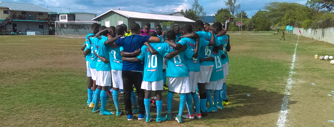 Denbigh in the huddle before their game against Cross Keys