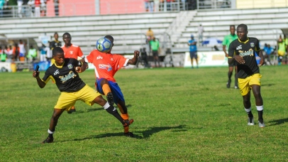 Game action between Clarendon College and Lennon High