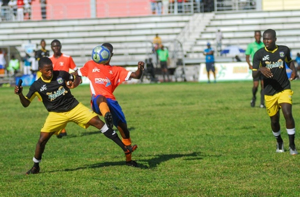 Game action between Clarendon College and Lennon High