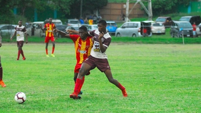 Game action between St. James and Cornwall College