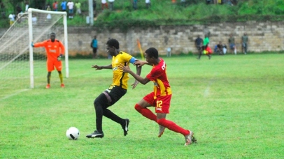 Cornwall College player pressures the Anchovy defense in their 1-0 win