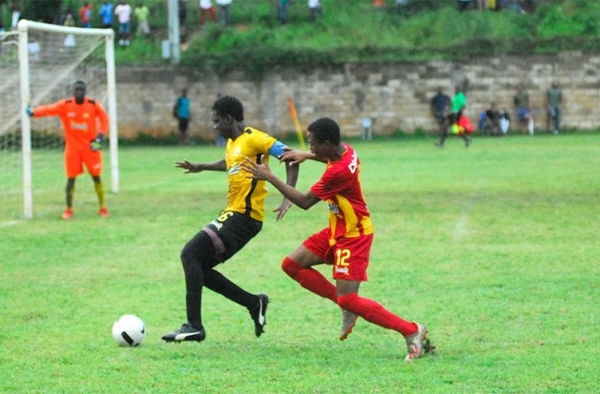 Cornwall College player pressures the Anchovy defense in their 1-0 win