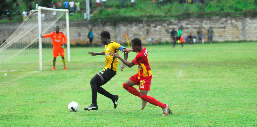 Cornwall College player pressures the Anchovy defense in their 1-0 win